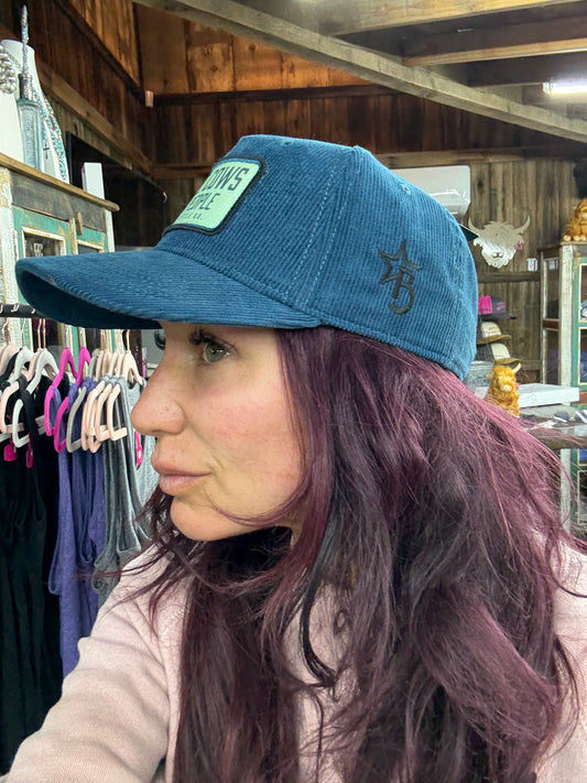 "Love cows, not people" Blue Corduroy Patch Trucker Hat