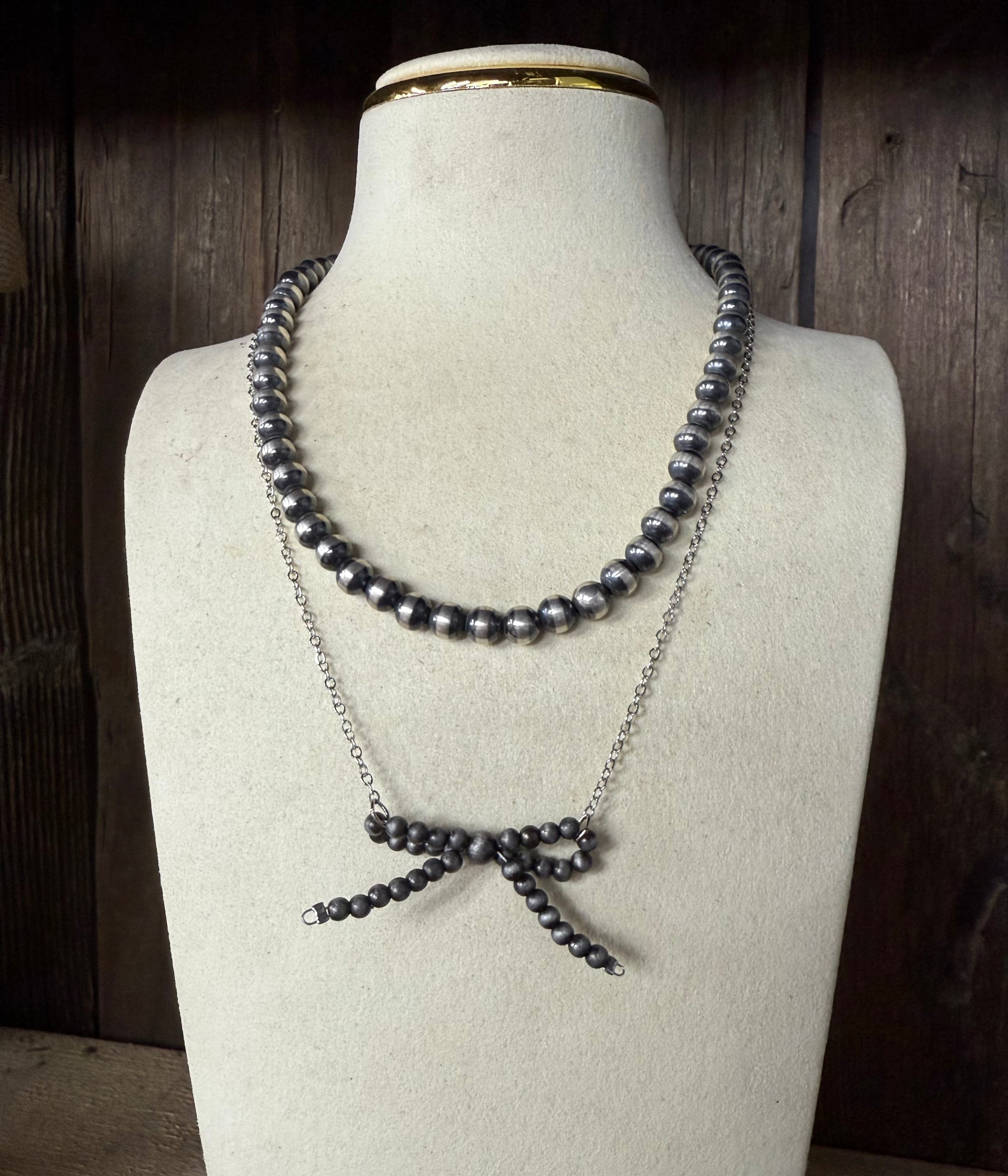 Native American, silver pearl bow inspired necklace