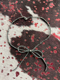 Load image into Gallery viewer, Beautiful Native American inspired silver pearl bow necklace ￼
