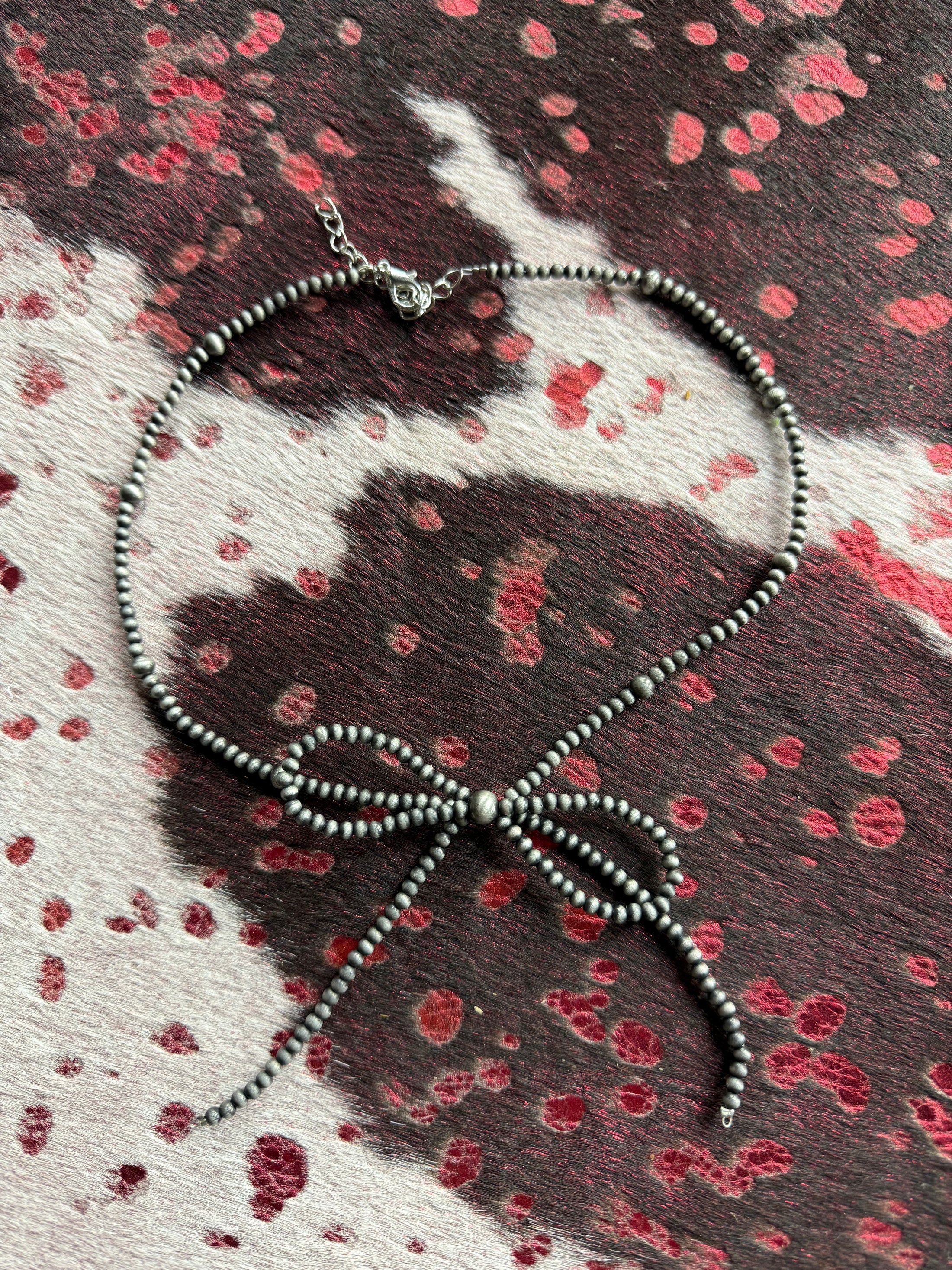 Beautiful Native American inspired silver pearl bow necklace ￼