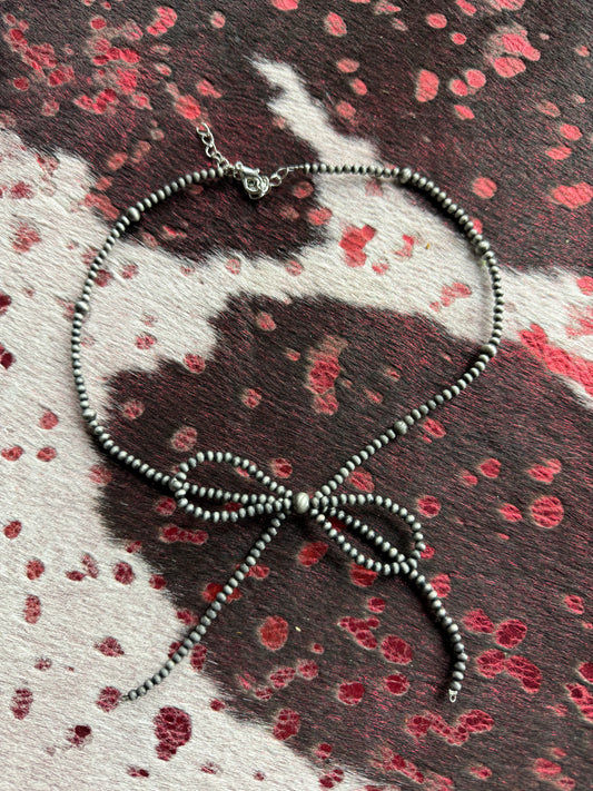 Beautiful Native American inspired silver pearl bow necklace ￼