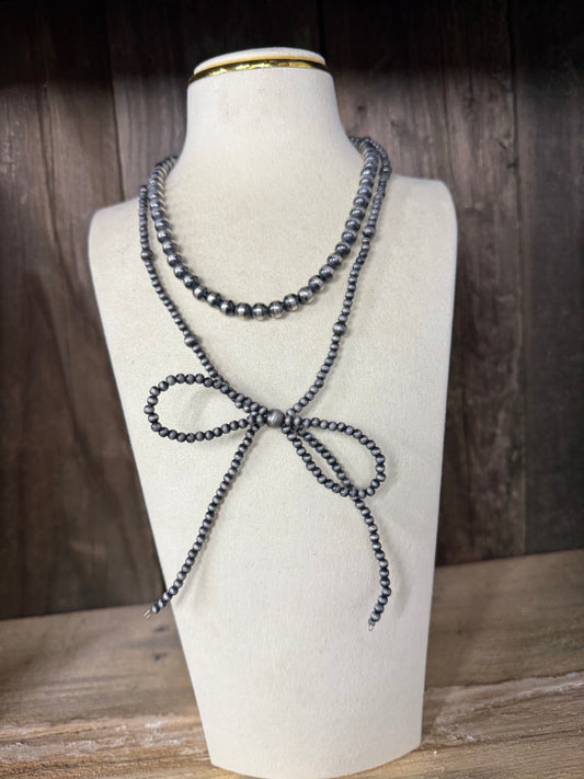 Beautiful Native American inspired silver pearl bow necklace ￼