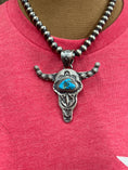 Load image into Gallery viewer, Native American Hand stamped Steerhead pendant complete with 18 inch Sterling Navajo pearls!
