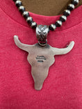 Load image into Gallery viewer, Native American Hand stamped Steerhead pendant complete with 18 inch Sterling Navajo pearls!
