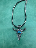 Load image into Gallery viewer, Native American Hand stamped Steerhead pendant complete with 18 inch Sterling Navajo pearls!
