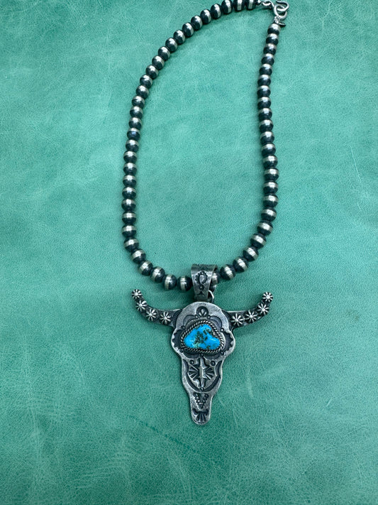 Native American Hand stamped Steerhead pendant complete with 18 inch Sterling Navajo pearls!