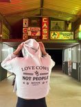 Load image into Gallery viewer, 🐮 Bougie “Love Cows, Not People” Crop Hoodie
